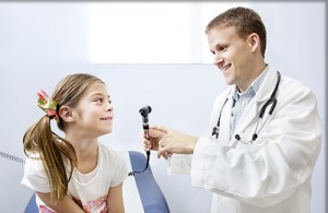 Girl getting a checkup at the Doctor's office